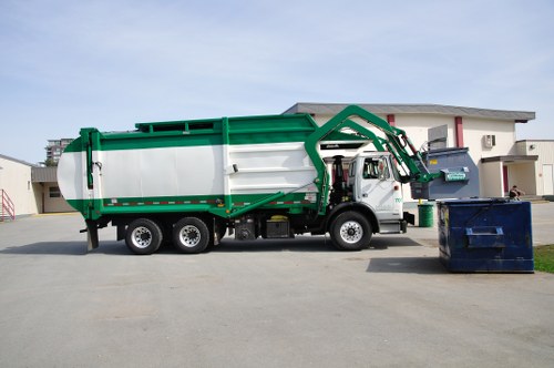 Safe loading of segregated green commercial wood waste for removal